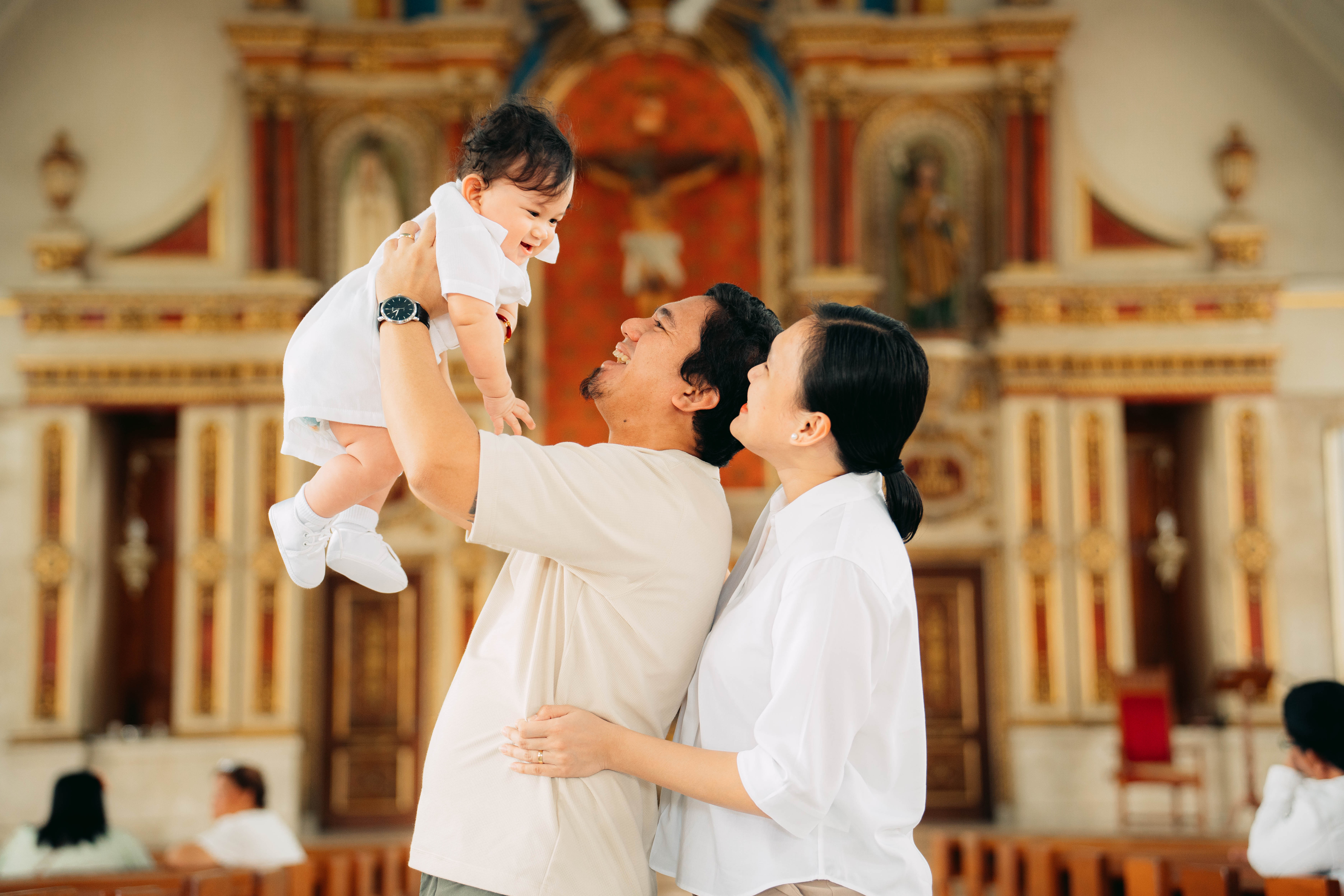 Baptism celebration — family and child at the church